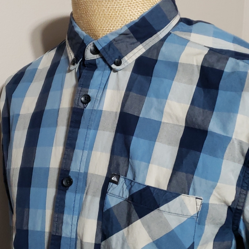 Quicksilver modern cut blue and grey plaid - Size is a Boy's Large